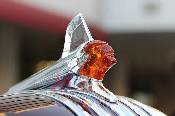 Chrome Hood Ornament of a Classic Car